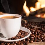 Hot coffee near fireplace