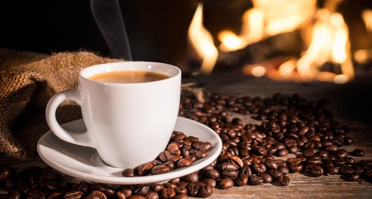 Hot coffee near fireplace